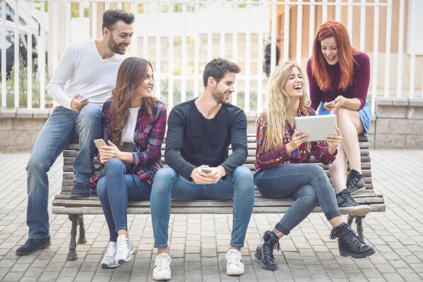 Person working thoughtfully at desk with natural lighting