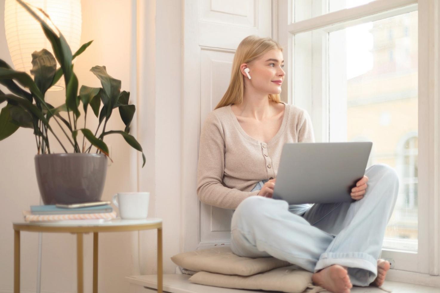 Digital learning setup with tablet and organized notes on wooden desk