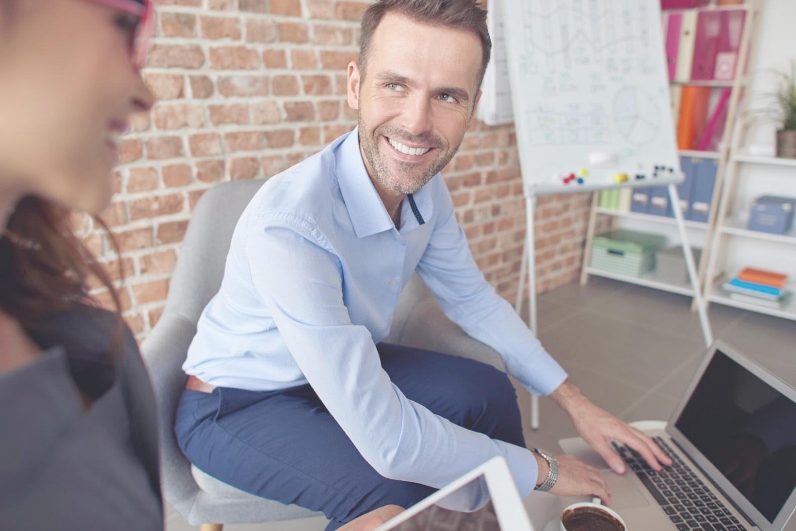 Person working through personal development materials at a bright workspace